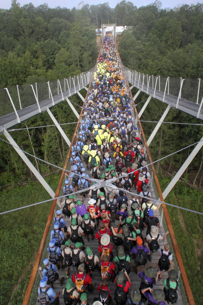 A river of Scouts from subcamps A and B flood across the Consol Energy Bridge en route to the opening show at the 2013 National Jamboree at the Summit Bechtel Reserve in New Hope, WV.(BSA Photo by Greg Crenshaw)
